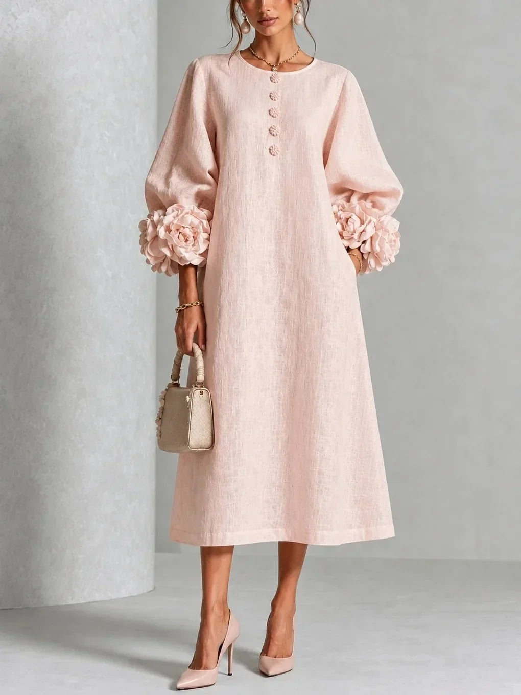 QUINTINA | Vestido midi con flores en relieve y manga farol