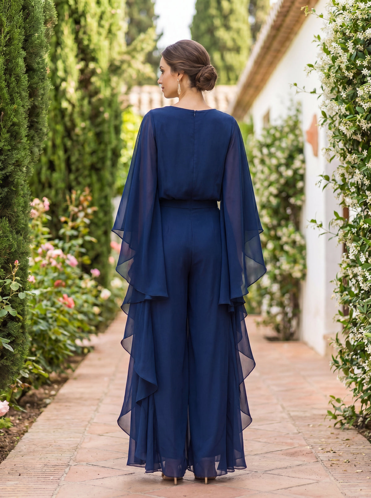 FUENSANTA | Conjunto de top con manga capa y falda de volantes