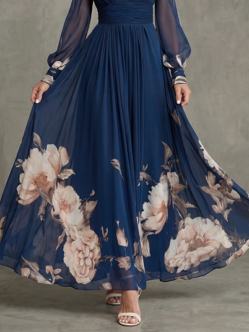 TARSILA | Vestido largo con bajo floral y mangas de transparencia